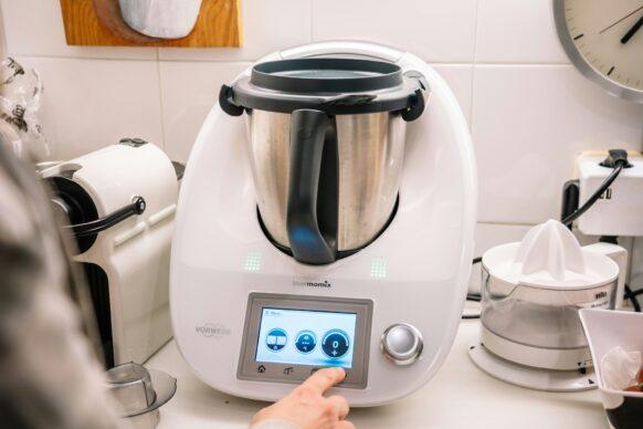 Barcelona, Spain, 15 January, 2021: Two women using thermomix at home