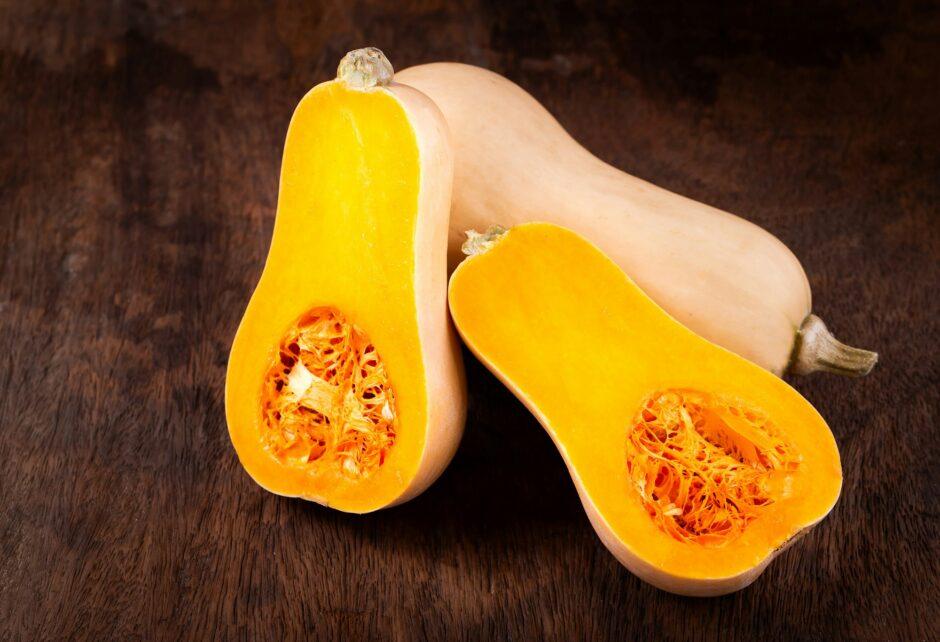 butternut squash over old wood background