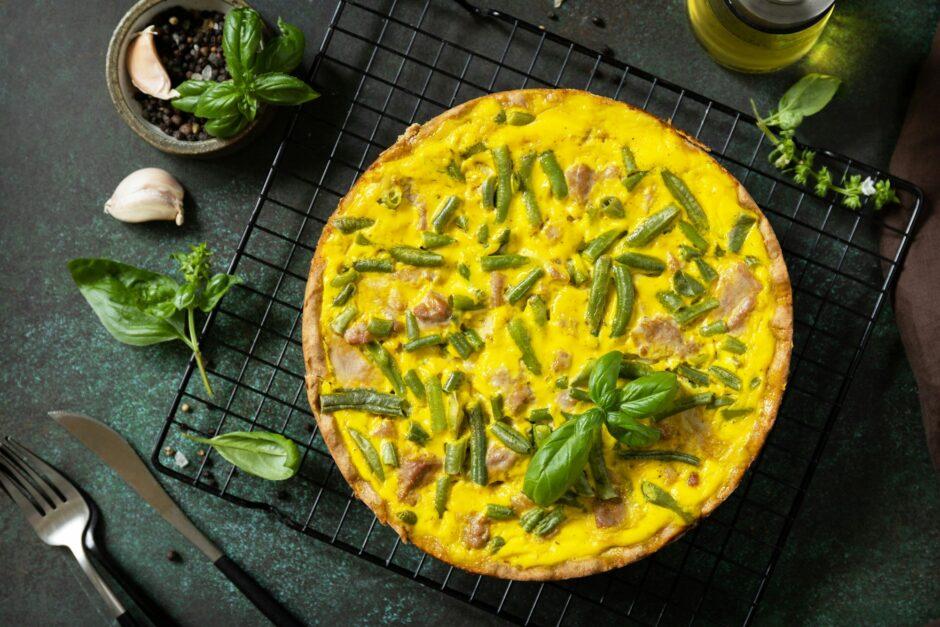 Сlassic quiche Lorraine pie with tuna, green beans and soft cheese.