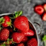 Strawberries in white basket. Fresh strawberries.