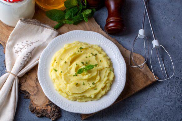 Serving of creamy mashed potato made from boiled potatoes